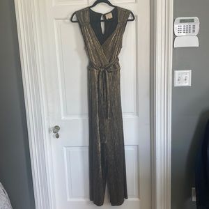 Copper metallic jump suit from Anthropologie. Crinkle stretchy fabric.